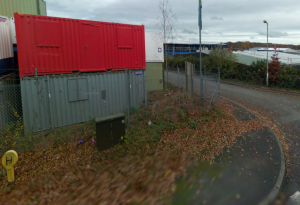 A lonely cabinet waits in vain for its fibre friend outside a Devon business park. Picture from Google Streetview.